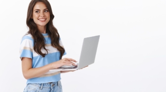 charming-young-woman-working-freelance-remote-from-office-hold-laptop-typing-university-essay-turn-left-smiling-copy-space-joyful-browsing-web-using-computer (1)